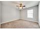 Bedroom with neutral carpet and paint, natural light from window creates a bright and comfortable space at 1706 Baylor Dr, Rock Hill, SC 29732