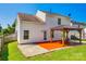 A view of the house's backyard, complete with wooden pergola, lawn and full perimeter fence at 1706 Baylor Dr, Rock Hill, SC 29732