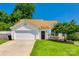 Charming single-story home featuring a well-manicured lawn and attached two-car garage at 1706 Baylor Dr, Rock Hill, SC 29732