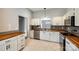 Stylish kitchen with stainless appliances, wood countertops, tile floors, and a gray backsplash at 1706 Baylor Dr, Rock Hill, SC 29732
