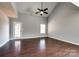 Spacious living room featuring high ceilings, hardwood floors, and a ceiling fan at 1706 Baylor Dr, Rock Hill, SC 29732