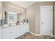 Bright bathroom with double sinks, large mirror, and ample counter space at 1921 Williford Woods Ln, Rock Hill, SC 29730