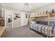 Bright bedroom with a bunk bed, neutral walls, and soft carpet at 1921 Williford Woods Ln, Rock Hill, SC 29730