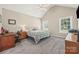 Large bedroom with a vaulted ceiling, work space, and plush carpeting at 1921 Williford Woods Ln, Rock Hill, SC 29730
