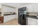Efficient kitchen layout with white cabinets and black appliances at 1921 Williford Woods Ln, Rock Hill, SC 29730