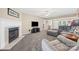 Cozy living room featuring a fireplace and seamless flow to other living areas at 1921 Williford Woods Ln, Rock Hill, SC 29730