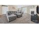 Comfortable living room with a fireplace, plush seating, and neutral decor at 1921 Williford Woods Ln, Rock Hill, SC 29730