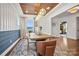 Well-lit dining area with hardwood floors, modern lighting, and stylish decor at 2005 Waxhaw Crossing Dr # 241, Waxhaw, NC 28173