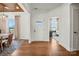 Inviting entryway with hardwood floors and natural light, leading to other rooms at 2005 Waxhaw Crossing Dr # 241, Waxhaw, NC 28173