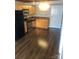 A well-lit kitchen with stainless steel appliances and wooden cabinets at 201 S Hoskins Rd # 328, Charlotte, NC 28208