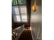 Staircase with natural light from a beautiful window above at 201 S Hoskins Rd # 328, Charlotte, NC 28208