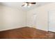 Bedroom with hardwood floors, ceiling fan, and neutral colored walls at 20241 Dovekie Ln, Indian Land, SC 29707