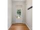 Bright foyer with hardwood floors and sidelight front door at 20241 Dovekie Ln, Indian Land, SC 29707