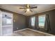Inviting bedroom with vinyl floors, updated ceiling fan and great natural light at 2509 1St St, Statesville, NC 28677