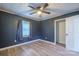 Comfortable bedroom with light flooring, modern fixtures and neutral paint at 2509 1St St, Statesville, NC 28677
