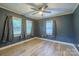 Cozy bedroom with vinyl floors, ceiling fan, neutral paint and ample natural light at 2509 1St St, Statesville, NC 28677