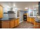 Kitchen with granite countertops, stainless steel appliances, and wood cabinets at 2509 1St St, Statesville, NC 28677