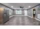 Bright and airy living room with stainless steel refrigerator and natural light at 2509 1St St, Statesville, NC 28677