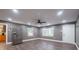 Bright living room with hardwood floors, stainless steel fridge and neutral paint at 2509 1St St, Statesville, NC 28677