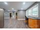 Office area with view to the rest of the house, with gray walls and wood floors at 2509 1St St, Statesville, NC 28677