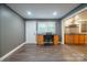 Office space with built in desk area and view into the kitchen area at 2509 1St St, Statesville, NC 28677