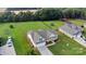 Aerial view of a home with a large yard, a trampoline and detached garage at 275 Dorothy Dr, China Grove, NC 28023
