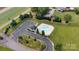 Aerial view of a community pool featuring a well manicured lawn and parking at 275 Dorothy Dr, China Grove, NC 28023