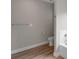 Bright bathroom featuring a soaking tub and wooden-look floors at 275 Dorothy Dr, China Grove, NC 28023