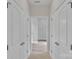 Bright hallway leading to a bathroom with a walk-in shower at 275 Dorothy Dr, China Grove, NC 28023