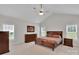 Spacious main bedroom featuring a ceiling fan and two bright windows at 275 Dorothy Dr, China Grove, NC 28023