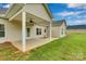 Covered patio with ceiling fan and an outdoor seating area at 275 Dorothy Dr, China Grove, NC 28023