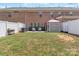 A backyard with a charming patio area, featuring a gazebo, furniture, and well-maintained lawn at 3159 Hartson Pointe Dr, Fort Mill, SC 29707