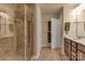 Elegant bathroom featuring a glass-enclosed shower with tiled walls and a modern showerhead at 3159 Hartson Pointe Dr, Fort Mill, SC 29707