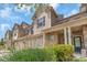 A townhome with a two-car garage, brick and siding exterior, and well-manicured landscaping at 3159 Hartson Pointe Dr, Fort Mill, SC 29707