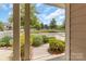 This inviting front porch offers a tranquil outdoor space to enjoy the well-maintained landscaping and neighborhood views at 3159 Hartson Pointe Dr, Fort Mill, SC 29707