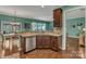 Kitchen featuring granite countertops, stainless steel appliances, and an open view to the living room at 3159 Hartson Pointe Dr, Fort Mill, SC 29707