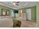 A spacious main bedroom features a TV and dresser along with an ensuite bathroom at 3159 Hartson Pointe Dr, Fort Mill, SC 29707