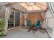 Cozy patio featuring a gazebo with stylish curtains, complemented by a table and chairs, perfect for outdoor relaxation at 3159 Hartson Pointe Dr, Fort Mill, SC 29707