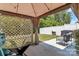Charming patio space featuring a covered gazebo, stylish furniture, and a glimpse of the landscaped backyard at 3159 Hartson Pointe Dr, Fort Mill, SC 29707