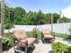 Comfortable backyard patio with outdoor seating, plants, and a serene space for relaxation at 342 Battery Cir, Clover, SC 29710
