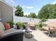 Cozy outdoor patio featuring comfortable seating, decorative plants, and a tranquil backyard atmosphere at 342 Battery Cir, Clover, SC 29710