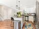 Open kitchen view with granite island, stainless steel appliances, and easy access to the living space at 342 Battery Cir, Clover, SC 29710