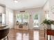Bright kitchen nook with natural light, a charming window seat, and a convenient exterior door at 342 Battery Cir, Clover, SC 29710