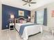 Comfortable main bedroom featuring a navy accent wall and a well-lit space at 342 Battery Cir, Clover, SC 29710