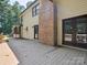 Exterior view of home featuring a large deck with backyard access at 3701 Bounty Ct, Matthews, NC 28104