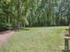 Large, lush backyard offers endless opportunities for recreation and relaxation at 3701 Bounty Ct, Matthews, NC 28104