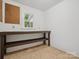 Unfinished basement featuring a workbench and window at 3701 Bounty Ct, Matthews, NC 28104