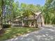 Charming home with a large yard, side entry garage, and inviting front porch at 3701 Bounty Ct, Matthews, NC 28104