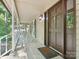 Inviting front porch featuring rocking chairs and a classic, welcoming entryway at 3701 Bounty Ct, Matthews, NC 28104