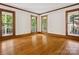 Bright living room with hardwood floors, natural light, and scenic views at 3701 Bounty Ct, Matthews, NC 28104